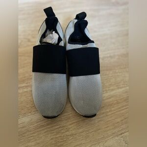 Alfani Women’s Slip-On Sneakers in Black and White